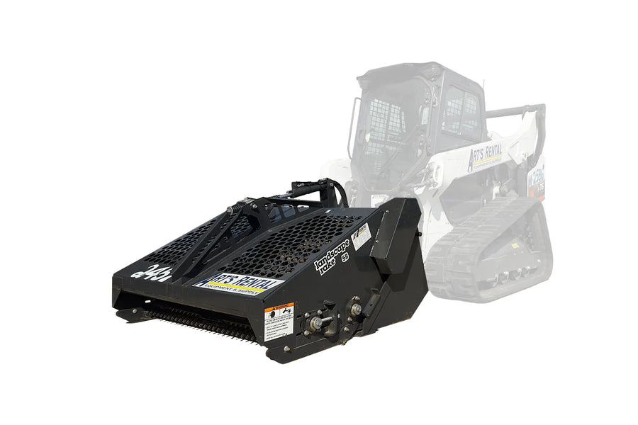 Black rock rake attachment on skid steer