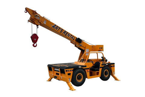 Yellow industrial crane with Art's Rental branding