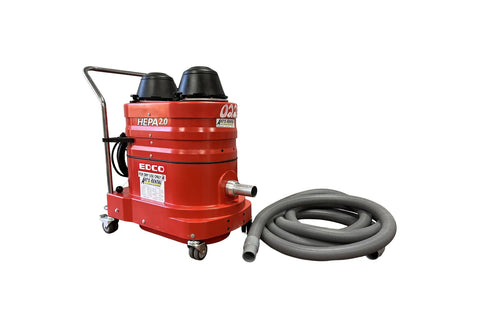 Red vacuum cleaner with hose
