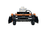 Orange and black harley rake attachment for utility loader