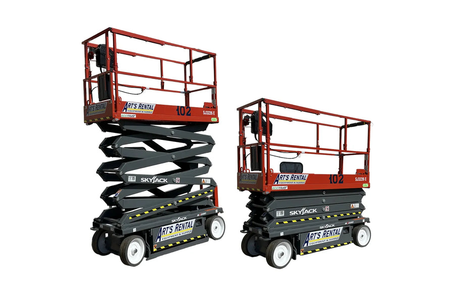 Orange and gray scissor lift, raised and lowered
