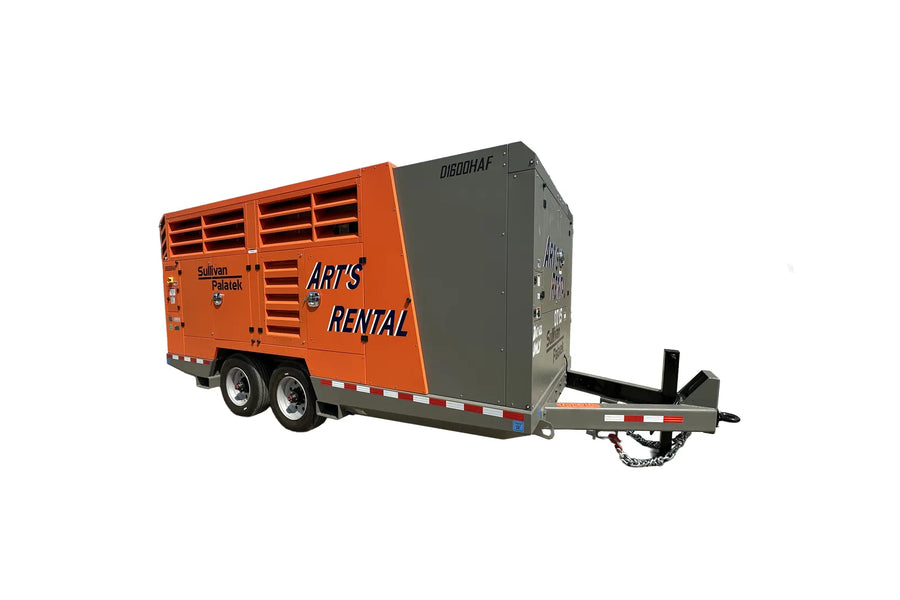 Orange and gray towable air compressor with 'Art's Rental' branding