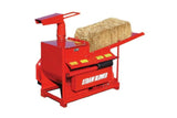 Red straw blower with bail of hay